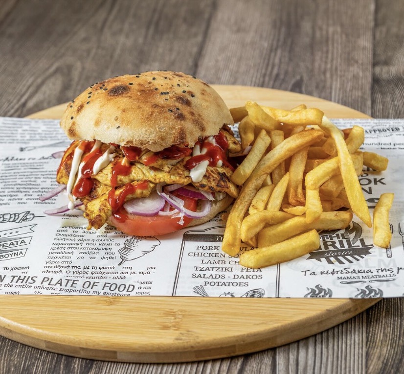 Homemade chicken burger in fresh puccia bread with fries
